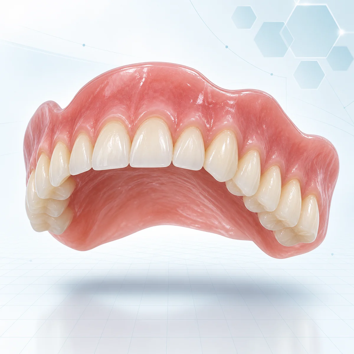 A complete removable upper denture shown as a separate finished appliance in a bright digital design environment